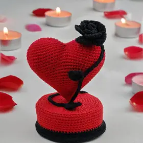 Plush crochet heart on a stand amigurumi, handmade Valentine's Day decoration pattern.