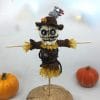 Plush crochet Halloween scarecrow amigurumi toy, spooky handmade pattern