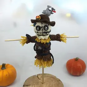 Plush crochet Halloween scarecrow amigurumi toy, spooky handmade pattern
