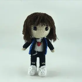 Plush crochet Eddie Munson amigurumi toy, inspired by Stranger Things, handmade pattern.