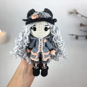 Plush crochet doll amigurumi toy in neutral gray tones, handmade pattern