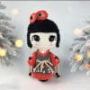 Plush crochet Kokeshi doll keychain, Japanese-inspired amigurumi toy, handmade pattern