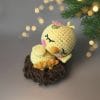 Plush crochet glowing chick amigurumi toy, handmade pattern.