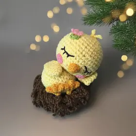 Plush crochet glowing chick amigurumi toy, handmade pattern.