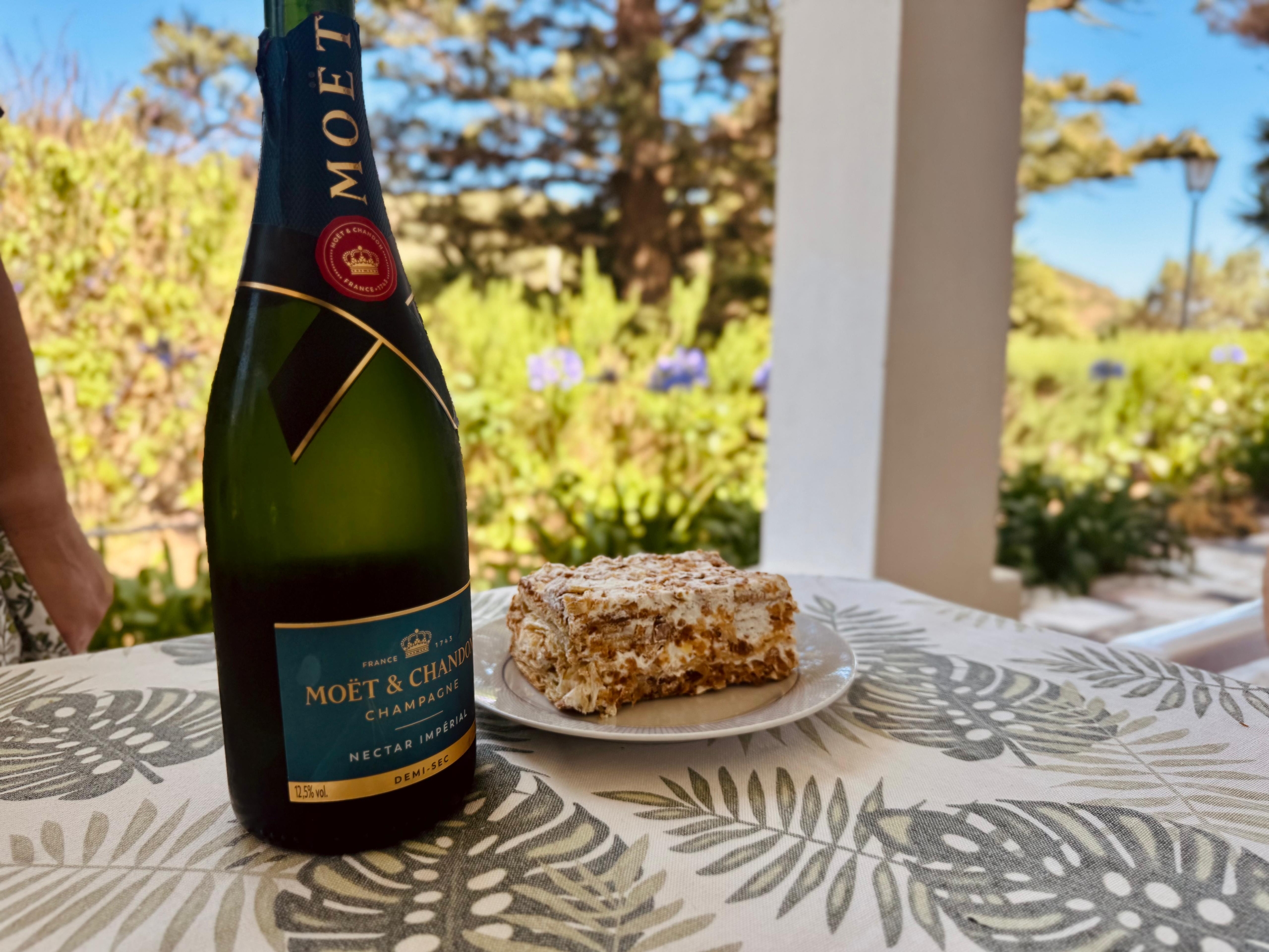 Moêt and a cake that I believe is called a Russo.. it's like a croissant cake with chantilly and almond flakes. I loved it!