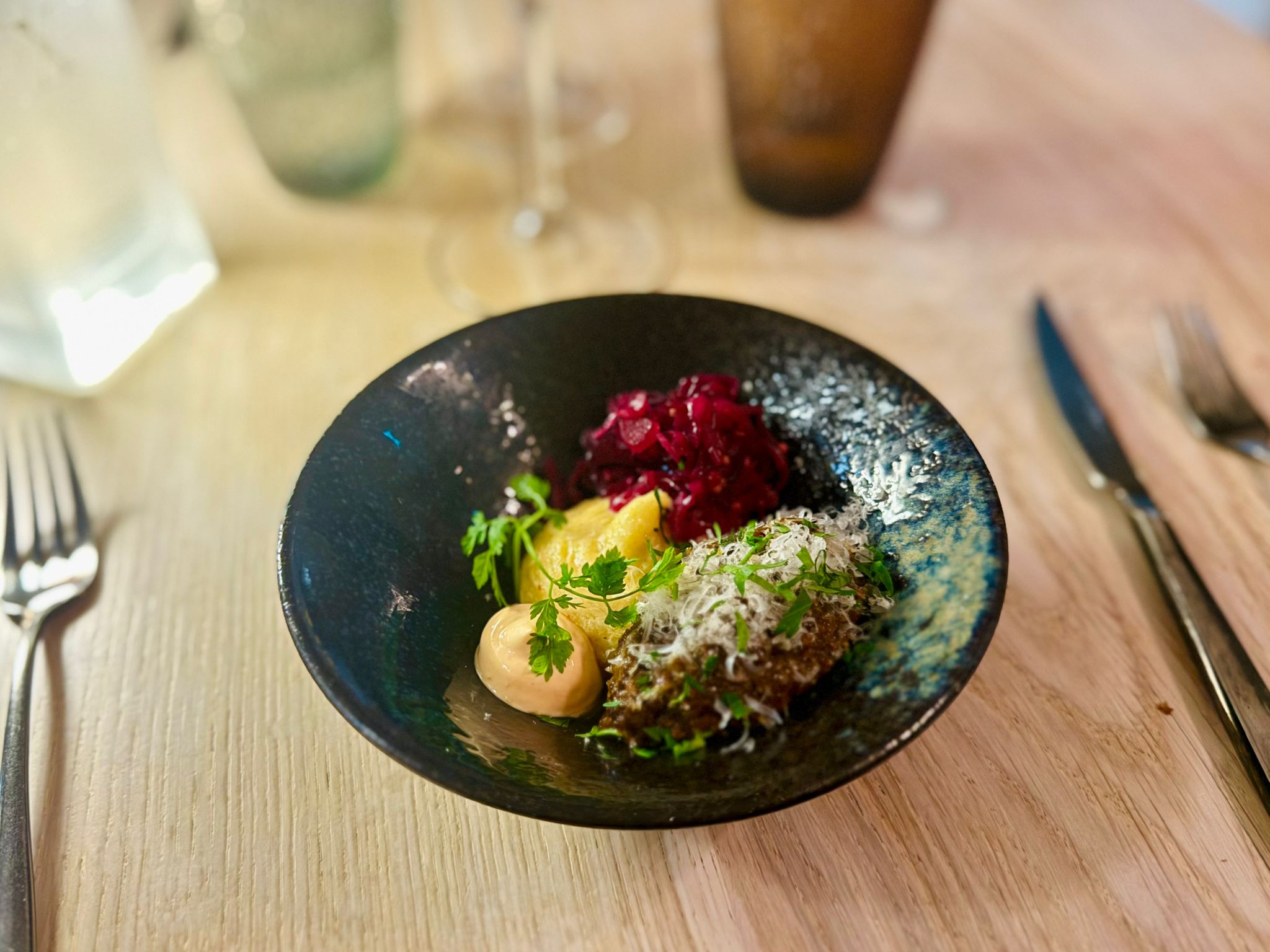 Plate no. 2 at Ragu. Moose-Ragu served with polenta and redkale.