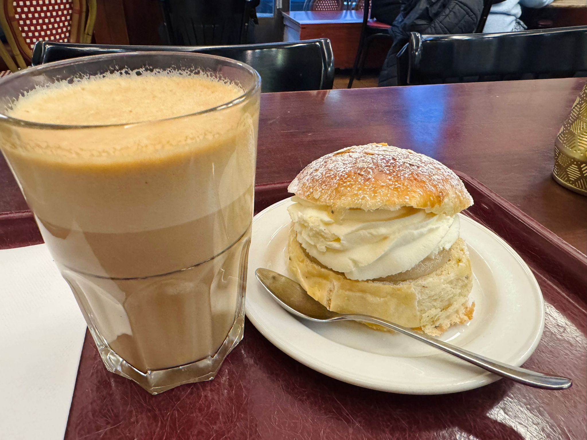 Picture of a Semla and cafe latte at Cafe Succes.