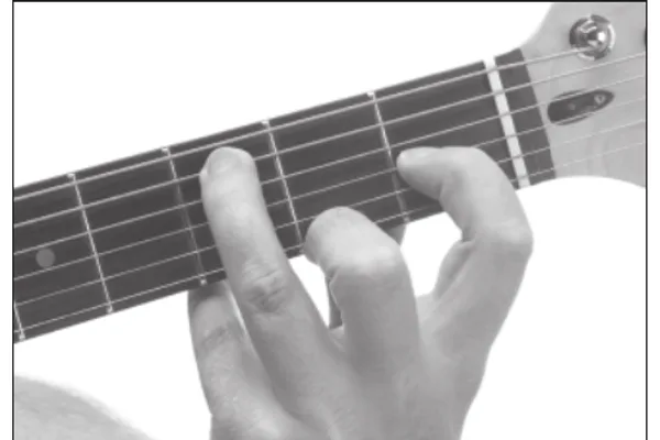 A♭7♭5(♯9) chord — a hand playing it on the guitar fretboard