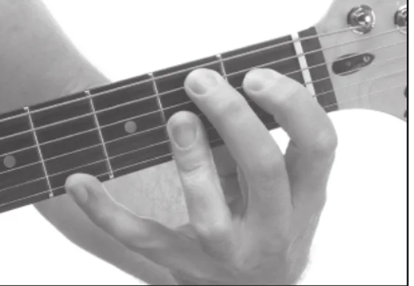 B13 chord — a hand playing it on the guitar fretboard