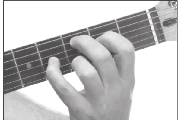 Cmaj9 chord — a hand playing it on the guitar fretboard