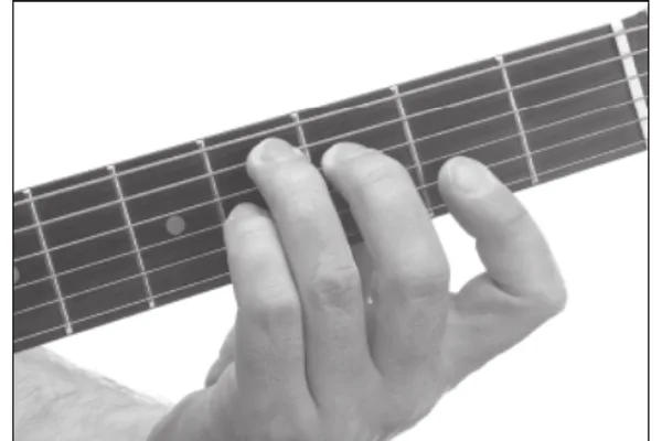 D♭11 chord — a hand playing it on the guitar fretboard