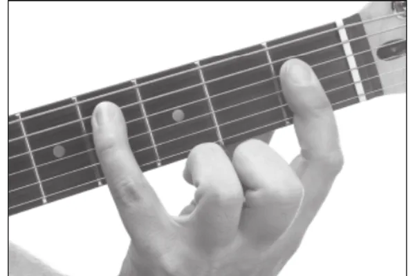 D♭maj9 chord — a hand playing it on the guitar fretboard