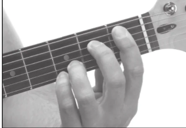 E7♭5(♯9) chord — a hand playing it on the guitar fretboard