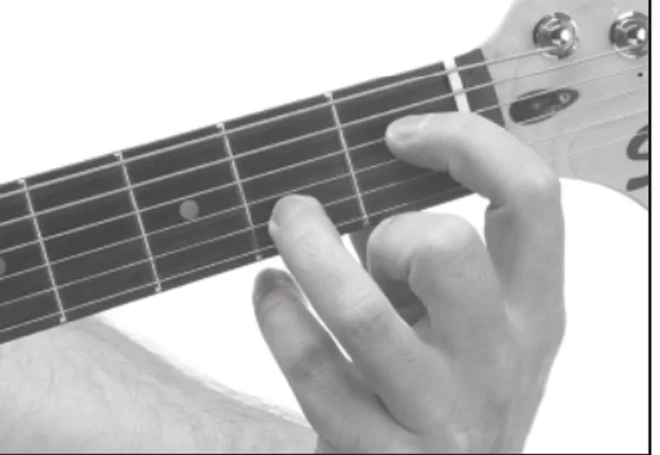 E♭7♭9 chord — a hand playing it on the guitar fretboard