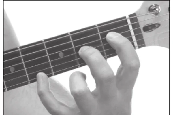 F7♭5(♯9) chord — a hand playing it on the guitar fretboard