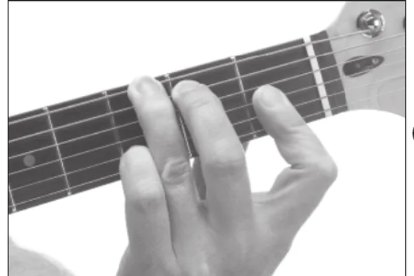 G7♭9 chord — a hand playing it on the guitar fretboard