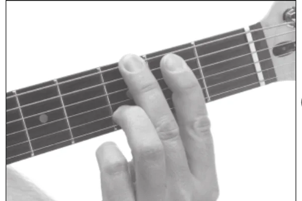 Gmaj13 chord — a hand playing it on the guitar fretboard