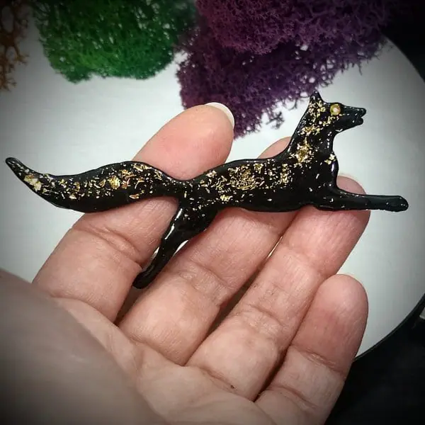 Running black fox brooch