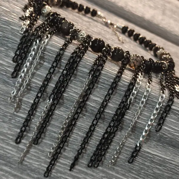 Black Queen necklace. Front view
