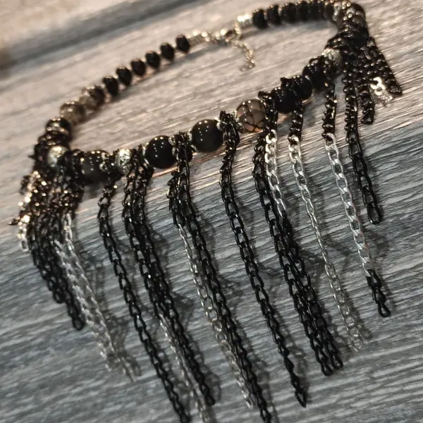 Black Queen necklace. Side view