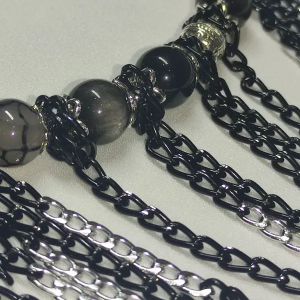 Black Queen necklace. Stones. Close-up