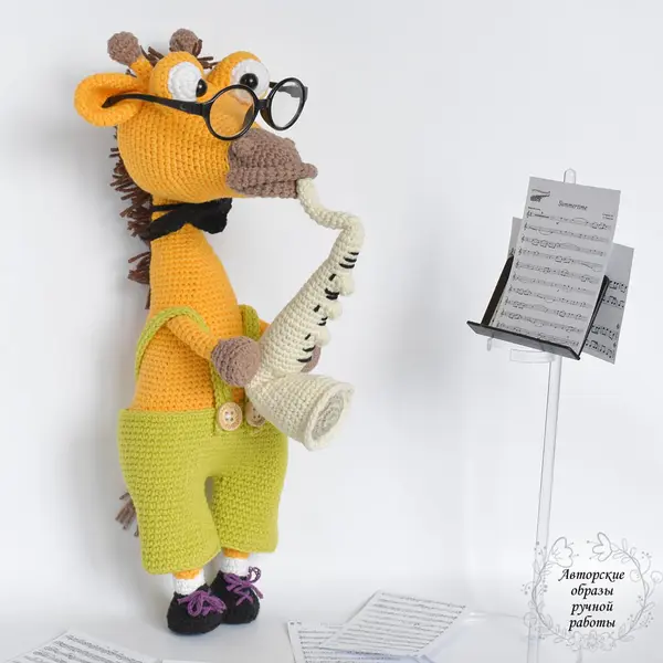 Giraffe with saxophone Author's handmade images