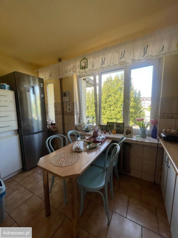 dom-w-centrum-ostrowi-maz-z-panelami-i-ogrodkiem