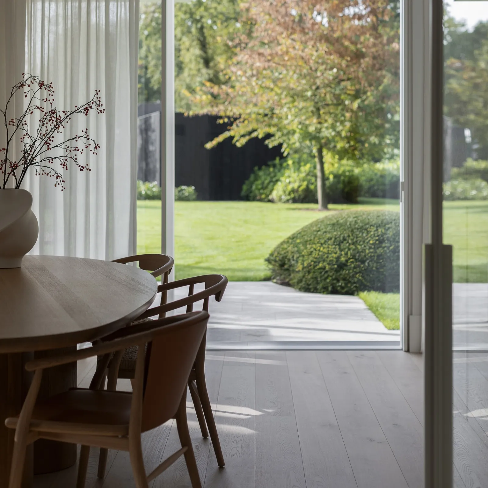 Woonkamer met zicht op tuin Oscar V