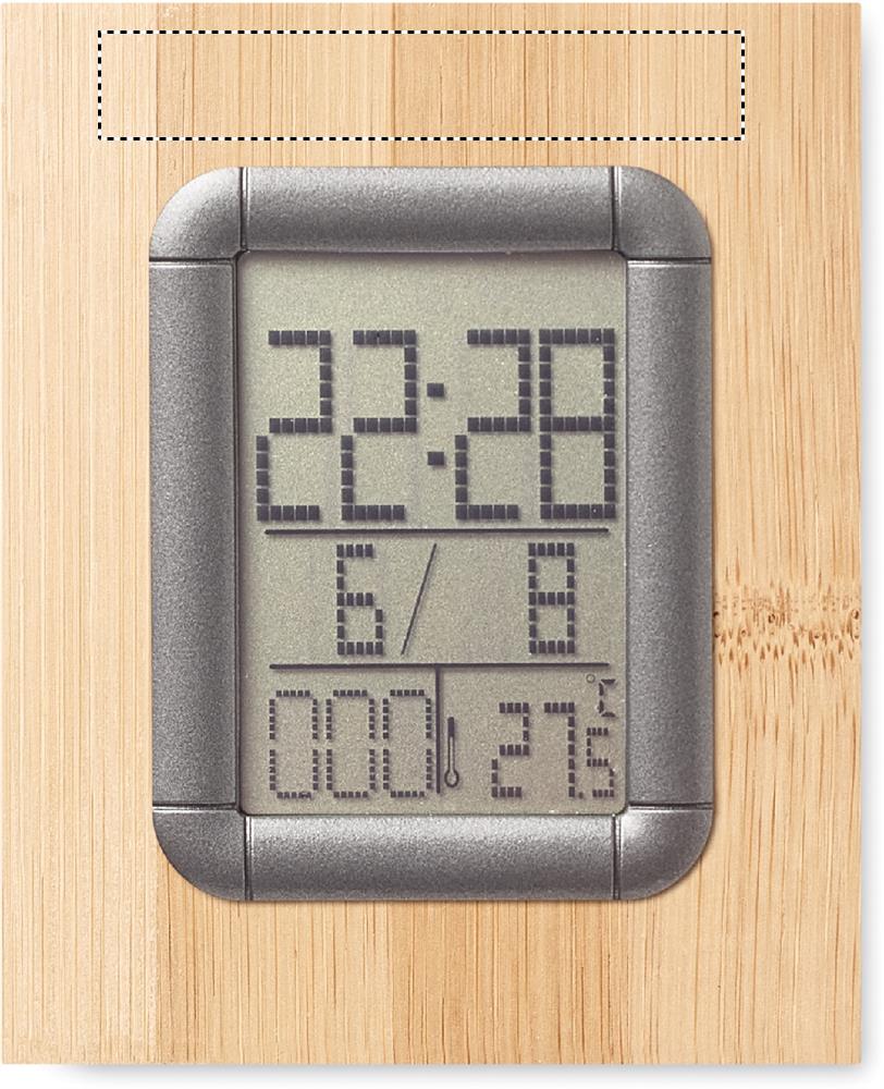 Bamboo pen holder and LCD clock above display 40