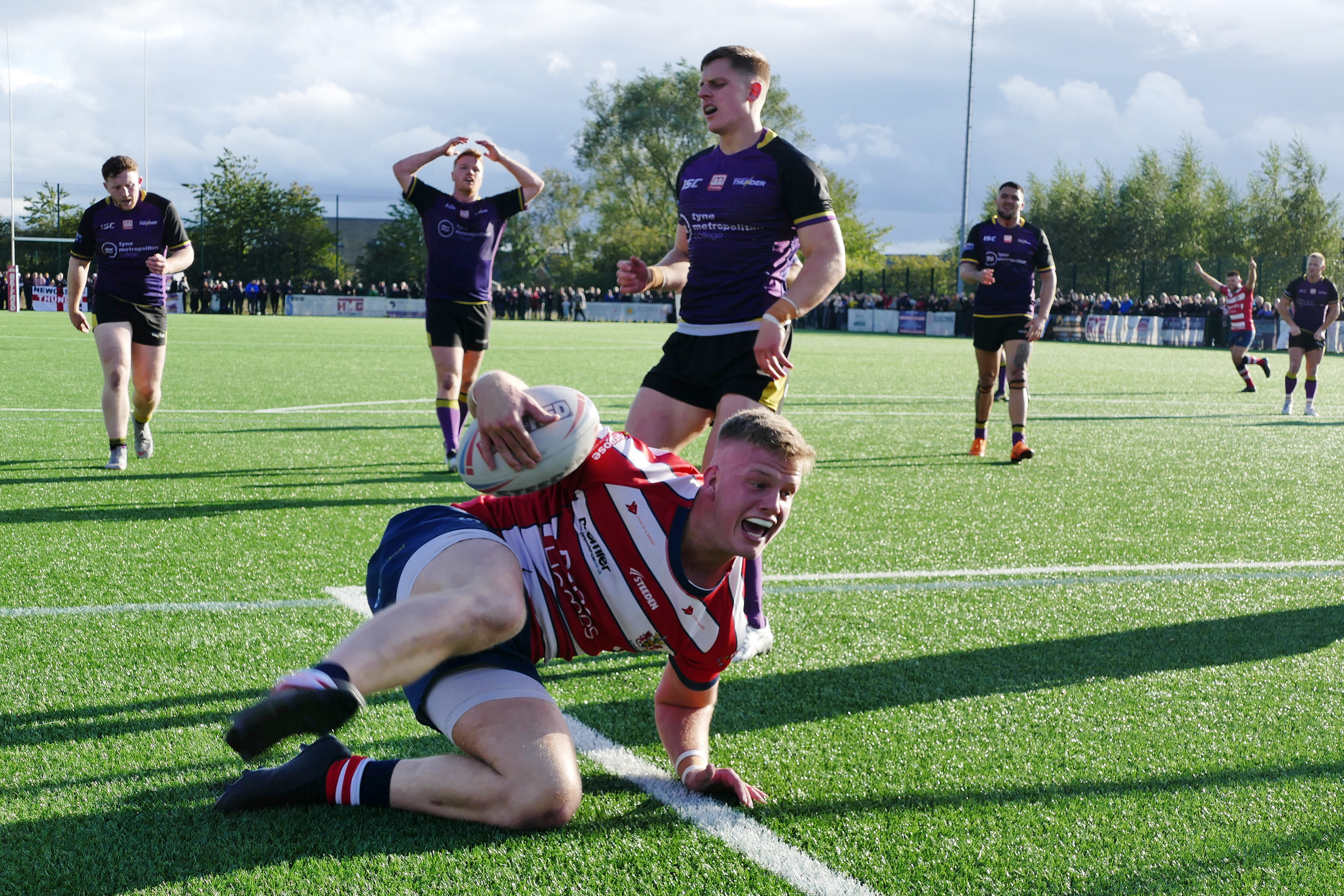 Jimmy Beckett goes over for the promotion clinching try