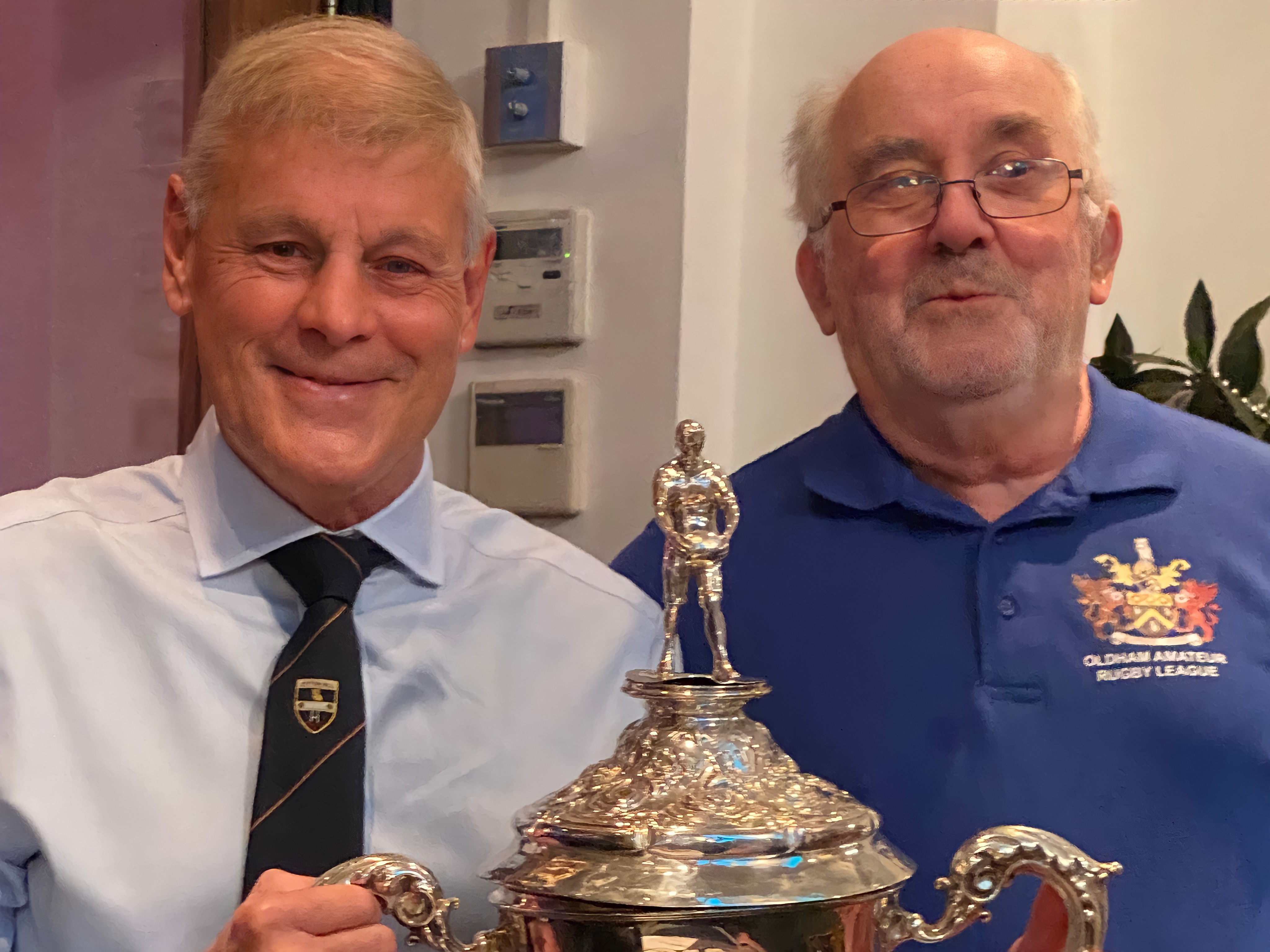 Picture shows 71-year-old reunion organiser Bob Norbury, a talented full-back in that 1985 Cup-winning side (left) with the trophy and Phil Bradbury.
