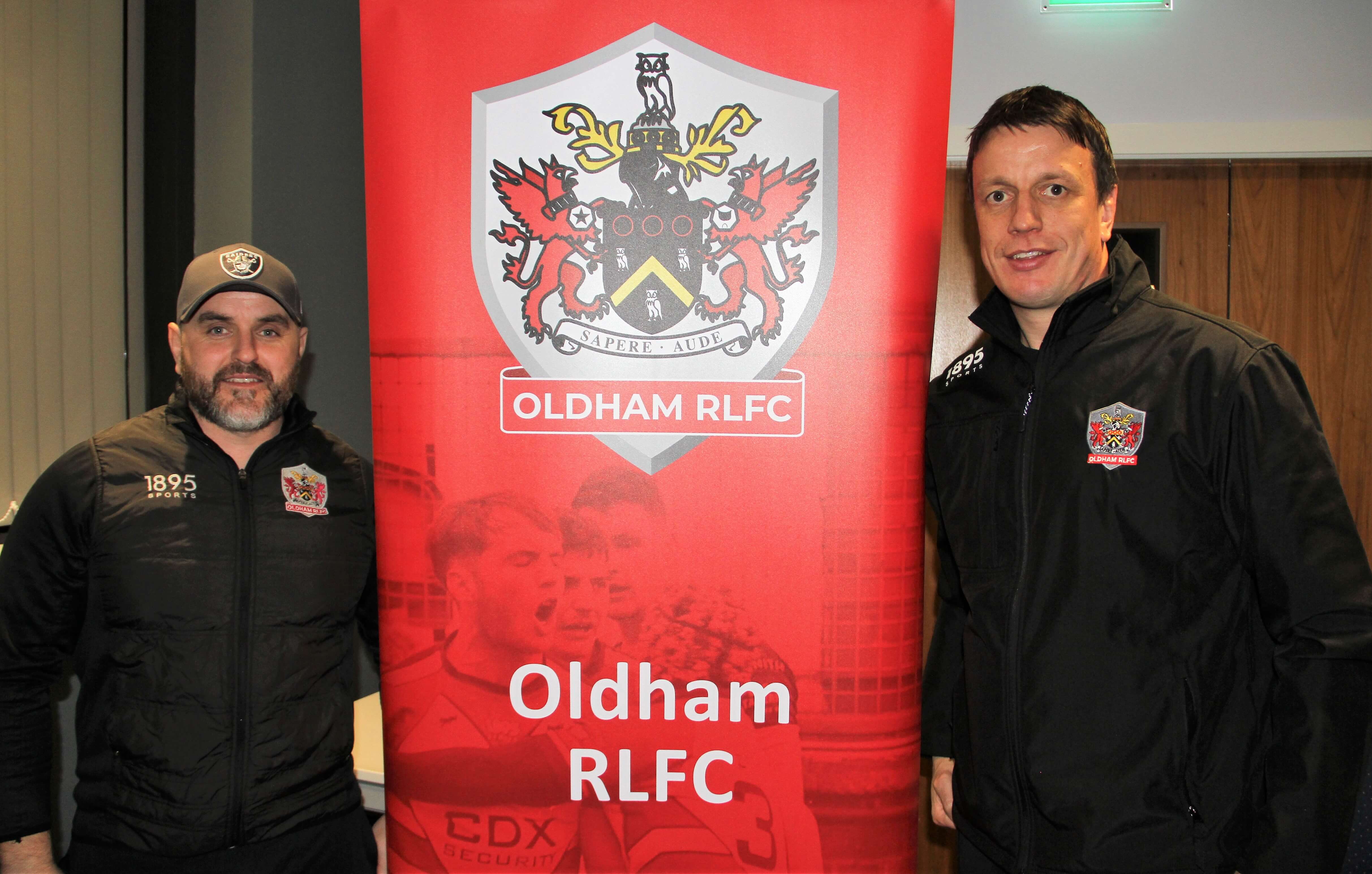 Promo banner and coaches together . . . Sheridan (left), Littler (right)