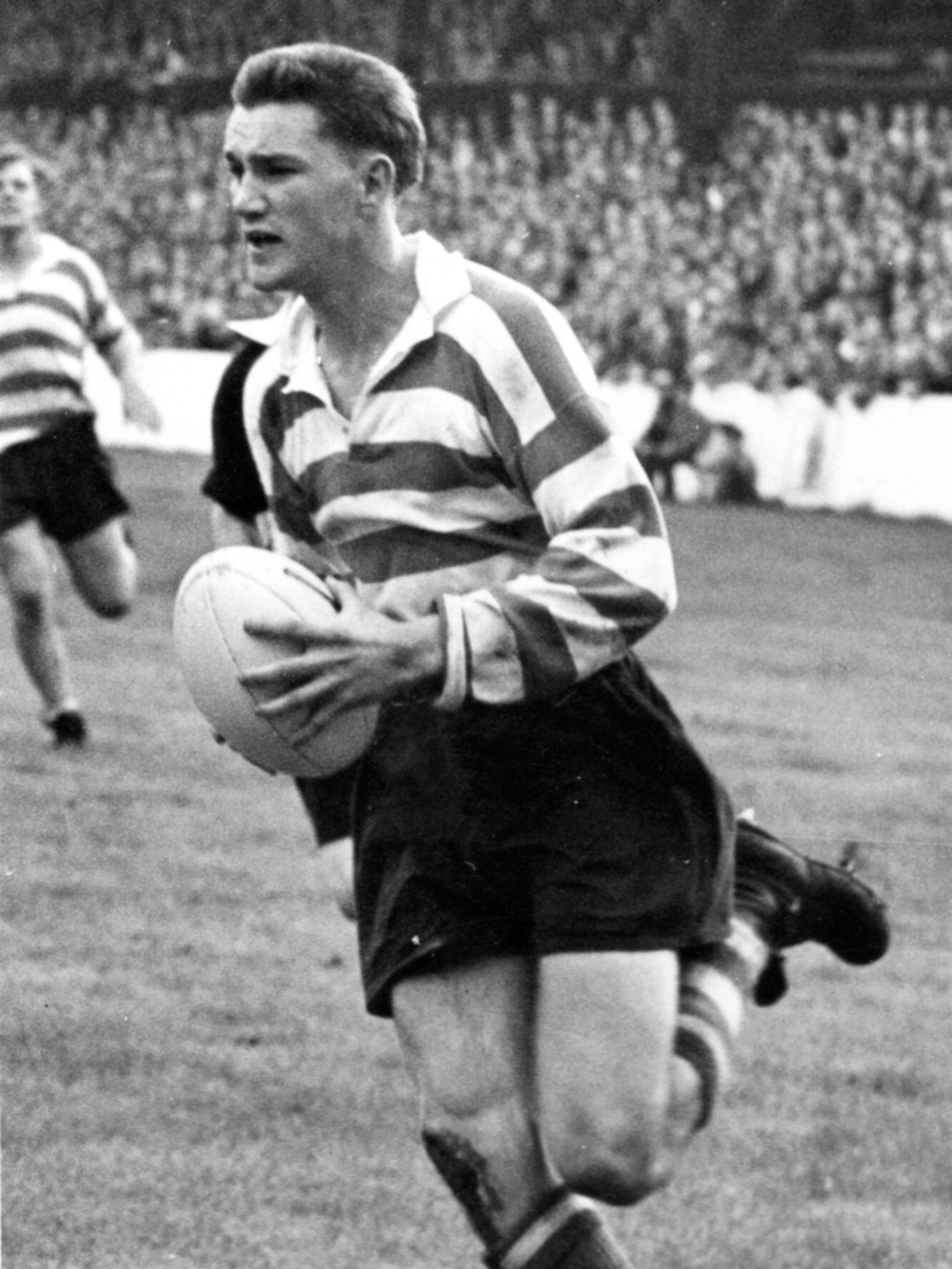 A young Geoff Sims on the move at Watersheddings. Picture by Oldham RL Heritage Trust