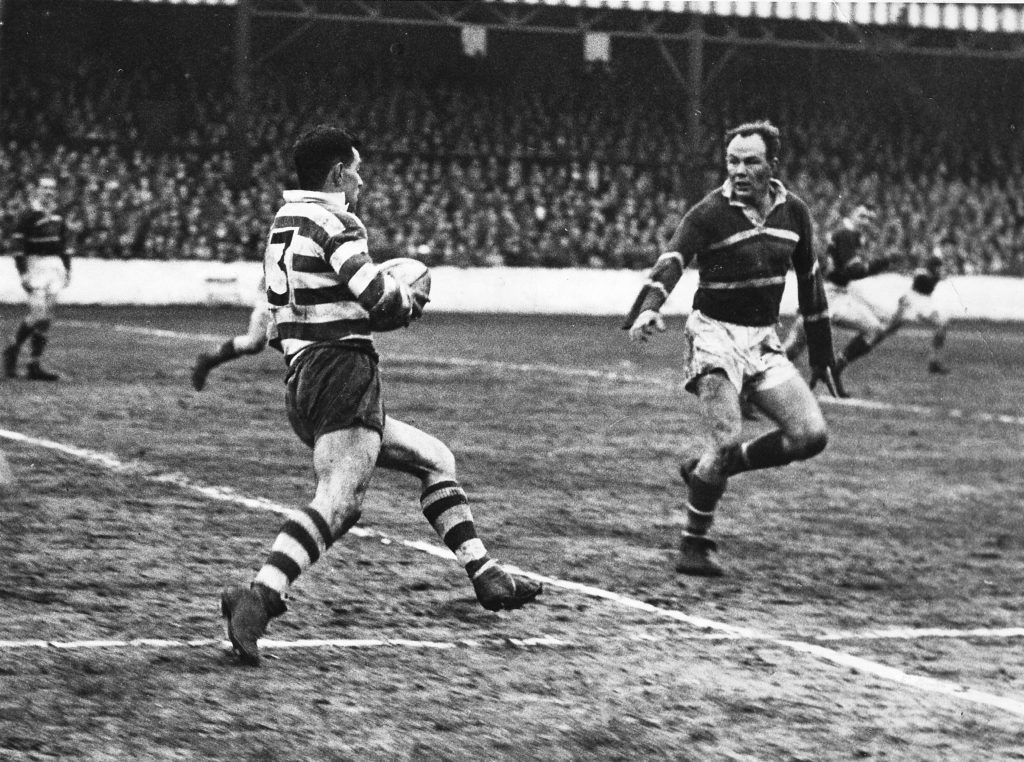 Alan Davies takes on Graham Shaw. Oldham v Hunslet - April 14th 1959 (Image via Oldham Rugby League Heritage Trust)