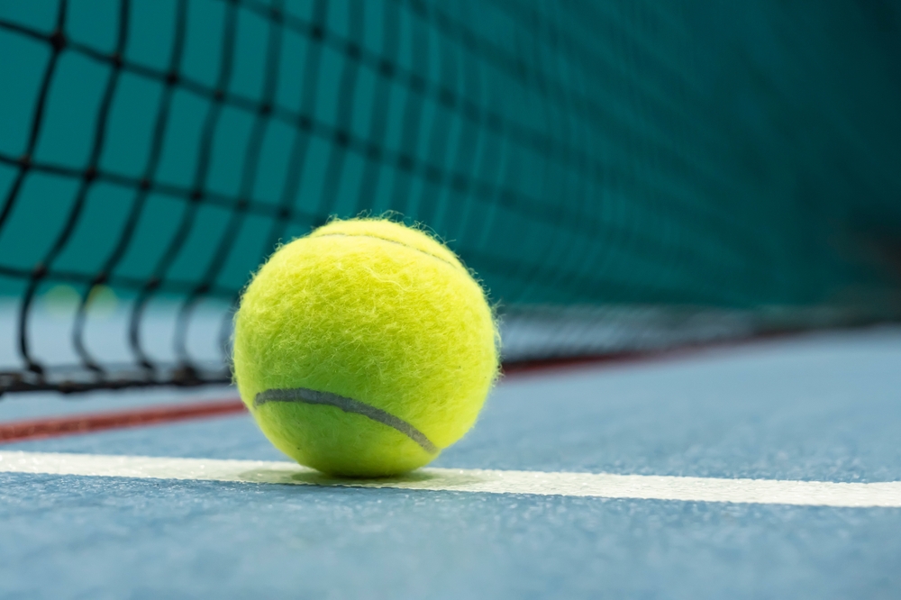 Tennis,Ball,On,Blue,Tennis,Court.,The,Concept,Of,A
