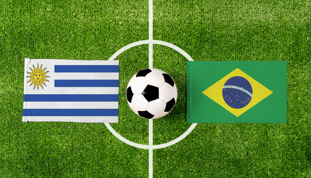 Top,View,Ball,With,Uruguay,Vs.,Brazil,Flags,Match,On