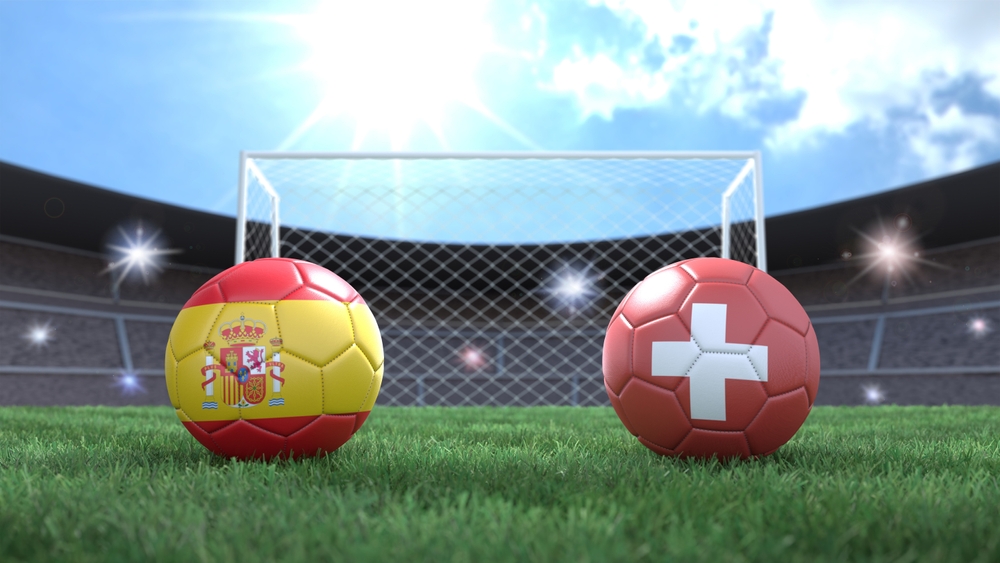 Two,Soccer,Balls,In,Flags,Colors,On,Stadium,Blurred,Background.