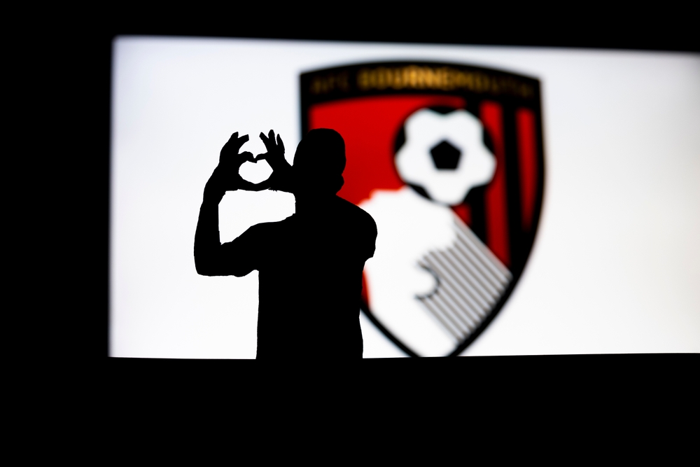 Young,Man,Making,Heart,Shape,With,His,Hands,Front,Of,Manchester City-Bournemouth