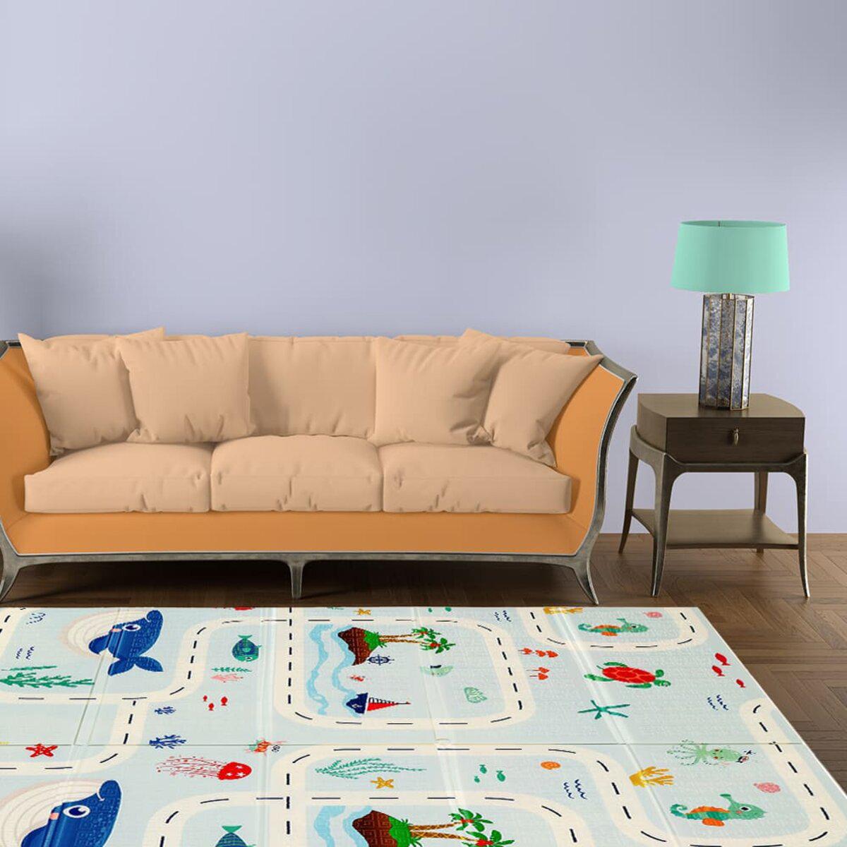 Дитячий складний термокилимок Океан у дитячій кімнаті біля дивана