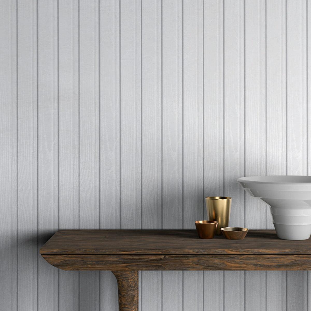 Біла декоративна WPC рейка на стіні в інтер’єрі з акцентом на стильне оздоблення