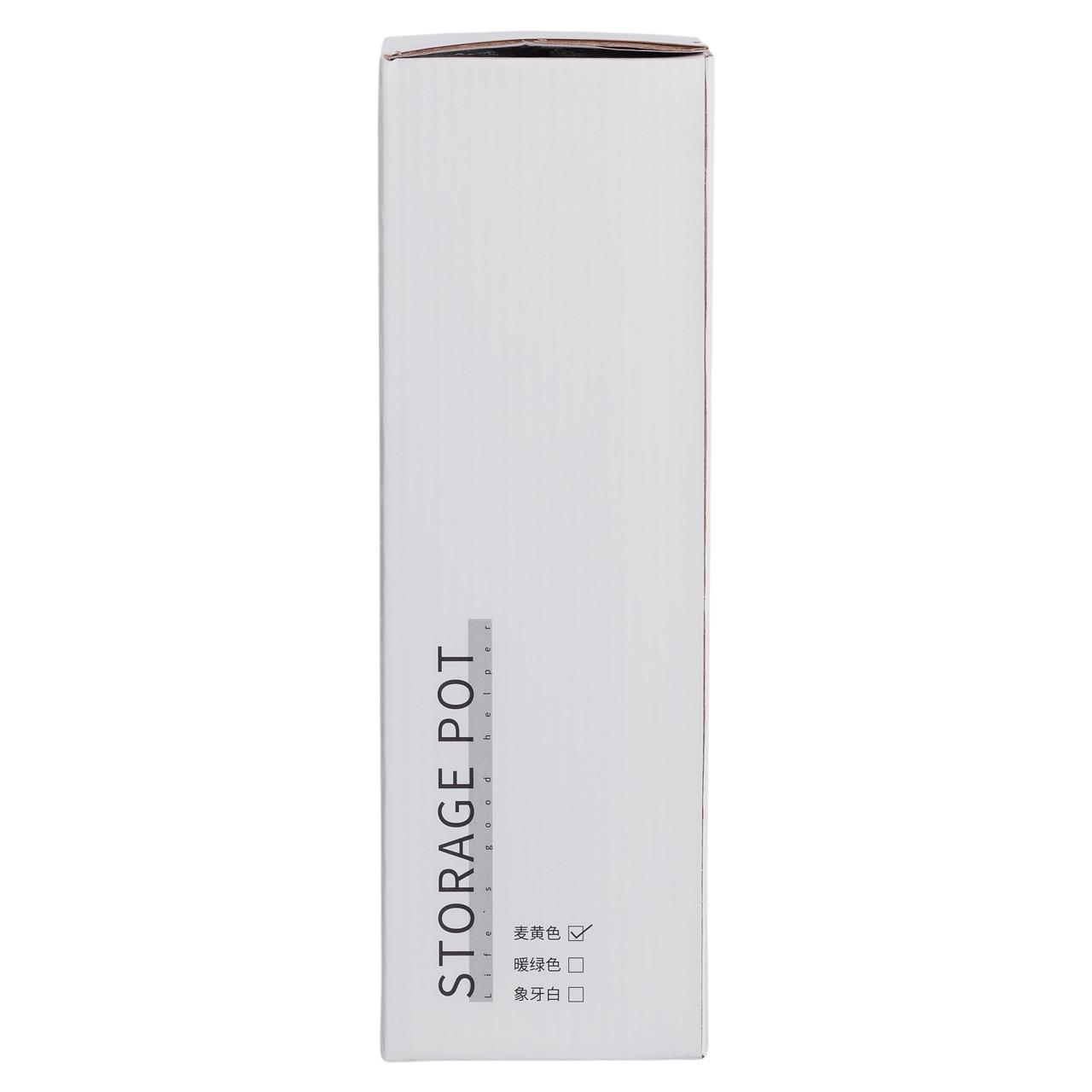 Желтая бутылка-дозатор для подсолнечного масла с гравитационным механизмом в интерьере кухни