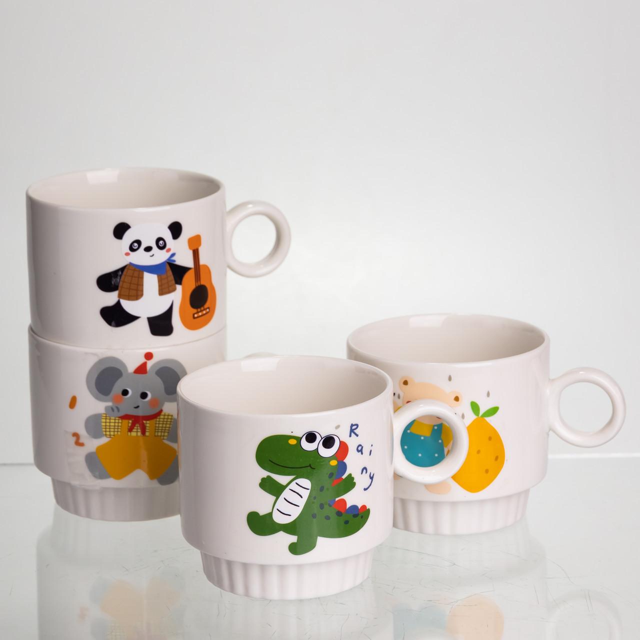 Фарфорові чашки для дітей із малюнками тварин у подарунковому наборі на підставці