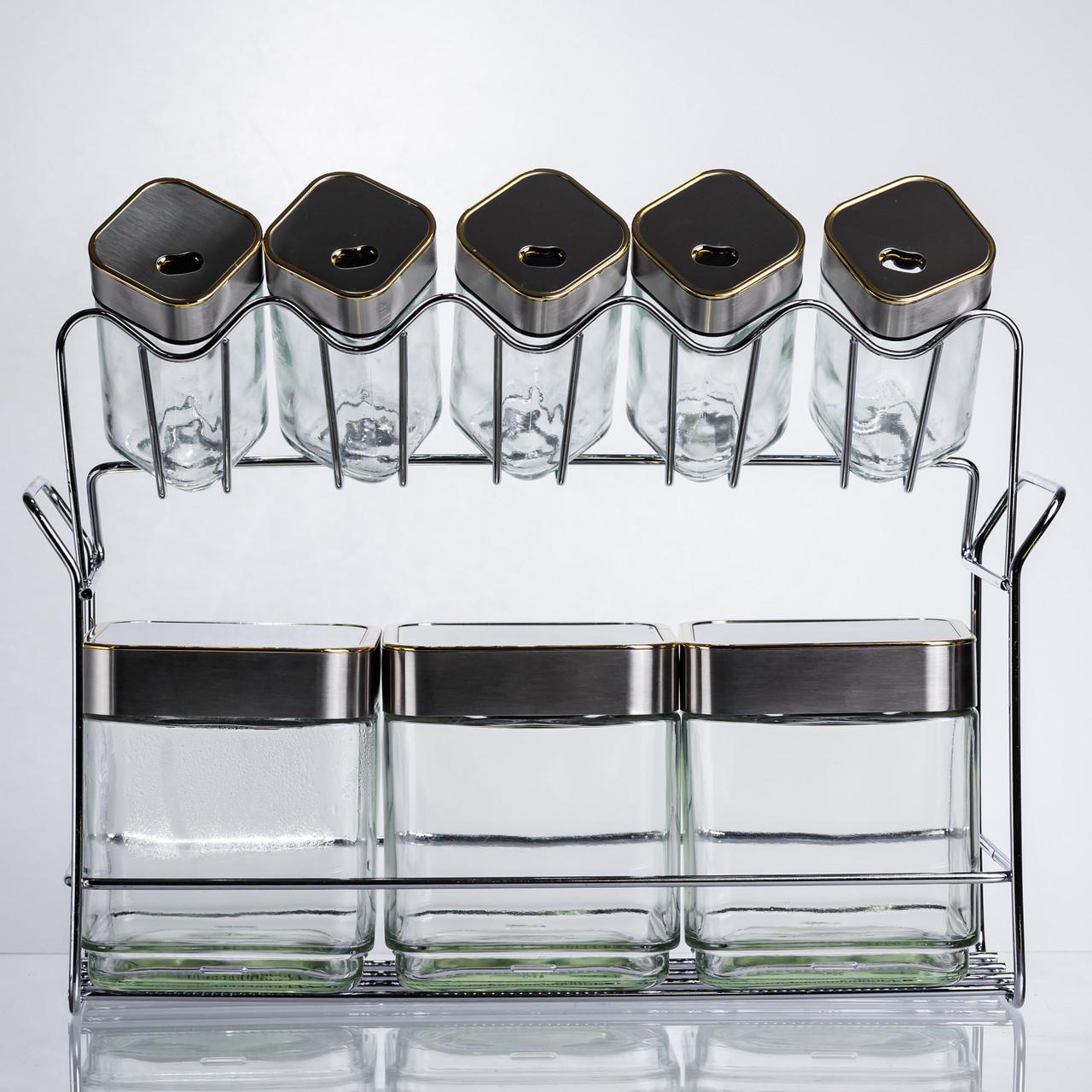 набір банок для спецій і сипучих продуктів на кухонній металевій підставці, фронтальний ракурс