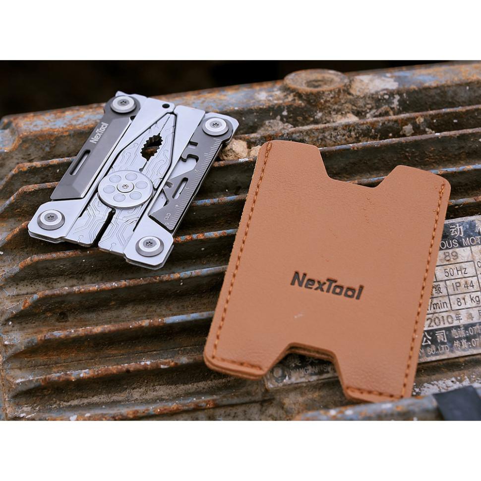 Надтонкий мультитул NexTool Silver Blade EDC на темному фоні з преміальним дизайном
