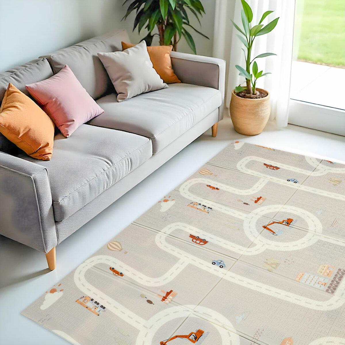 Дитячий термокилимок у кімнаті біля дивана, зручний складний килимок для ігор на підлозі