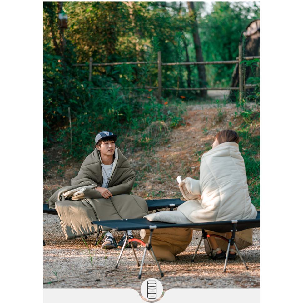 спальный мешок для кемпинга темно-зеленый в реальном применении, одноместный спальник с капюшоном