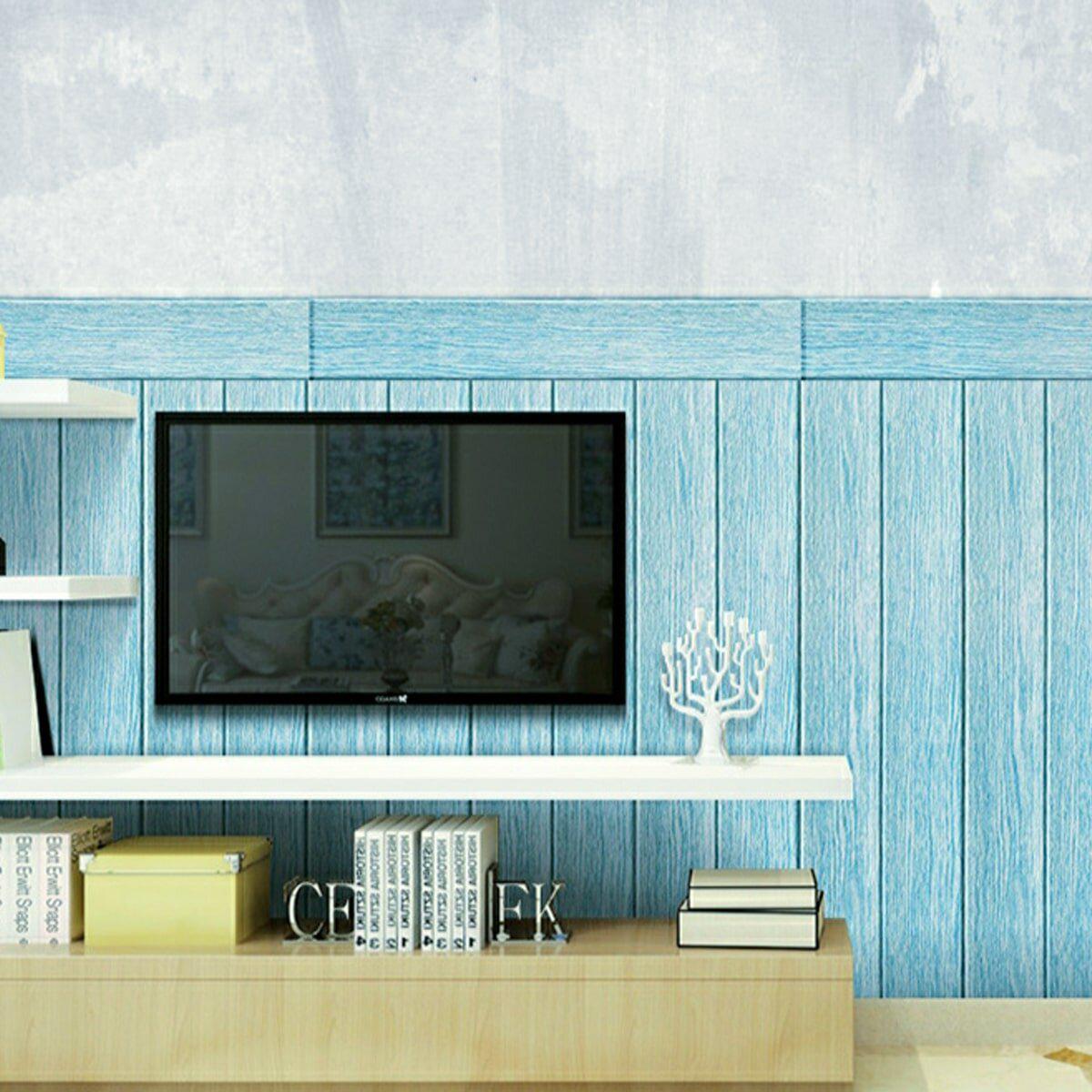 Декоративные 3D панели голубое дерево 700x700 — вариант в интерьере за телевизором