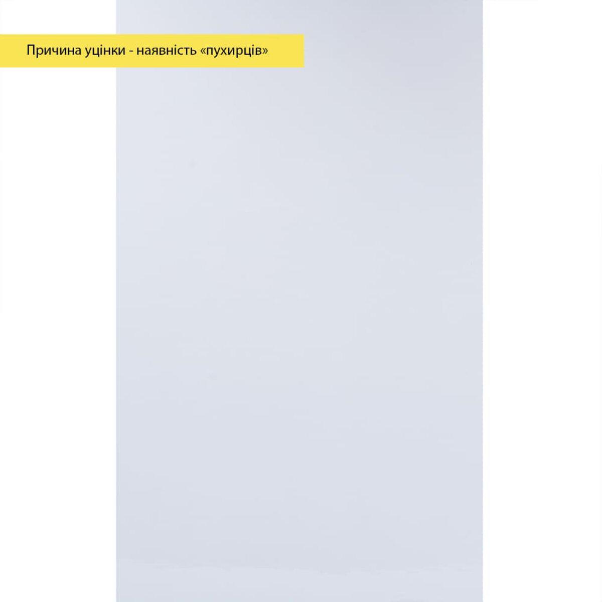 Поверхня уціненої білої вінілової плитки з пухирцями крупним планом